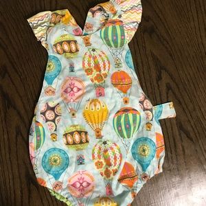 Handmade romper done by petals and pixie dust